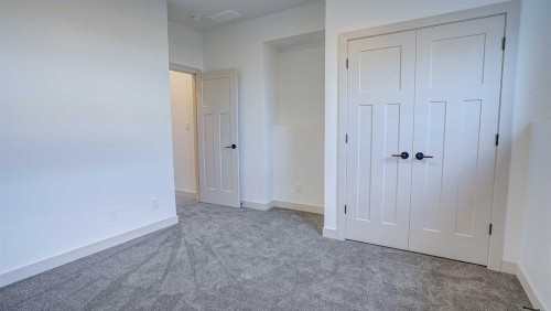 19 Ian Way, Sylvan Lake, AB - Indoor Photo Showing Other Room