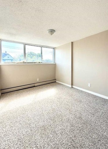 209-4820 47 Avenue, Red Deer, AB - Indoor Photo Showing Other Room