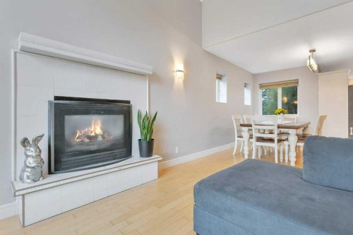 13 Fern Crescent, Sylvan Lake, AB - Indoor Photo Showing Living Room With Fireplace