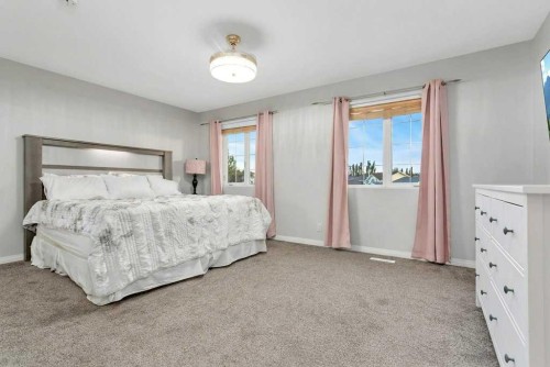 13 Fern Crescent, Sylvan Lake, AB - Indoor Photo Showing Bedroom
