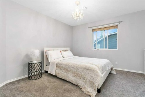 13 Fern Crescent, Sylvan Lake, AB - Indoor Photo Showing Bedroom