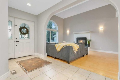 13 Fern Crescent, Sylvan Lake, AB - Indoor With Fireplace