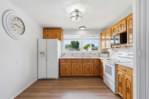 23 Fairway Avenue, Red Deer, AB - Indoor Photo Showing Kitchen With Double Sink