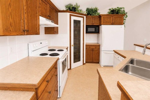96 Duckering Close, Red Deer, AB - Indoor Photo Showing Kitchen With Double Sink