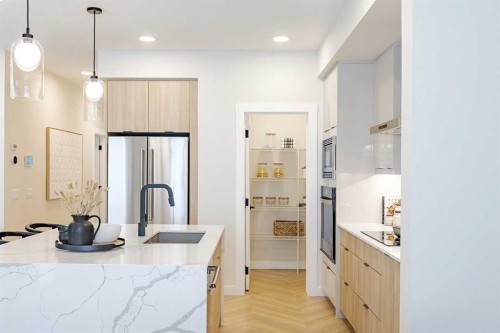 190 Rosemary Gardens Se, Calgary, AB - Indoor Photo Showing Kitchen With Upgraded Kitchen