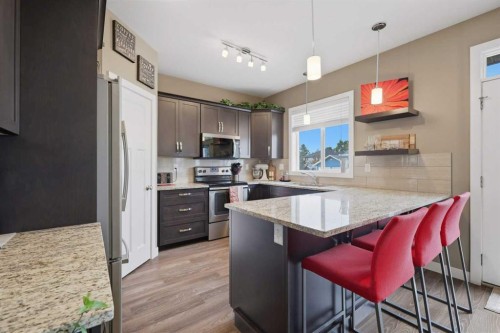 3908 49 Avenue, Ponoka, AB - Indoor Photo Showing Kitchen With Upgraded Kitchen