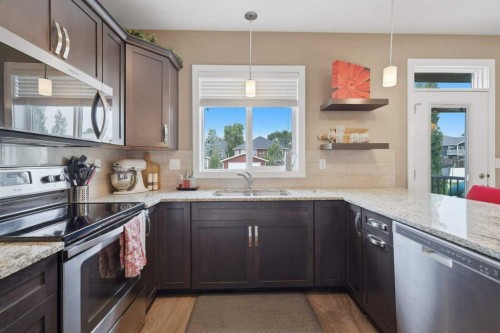3908 49 Avenue, Ponoka, AB - Indoor Photo Showing Kitchen With Double Sink