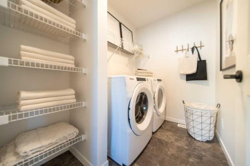 524 Tekarra Drive Nw, Calgary, AB - Indoor Photo Showing Laundry Room