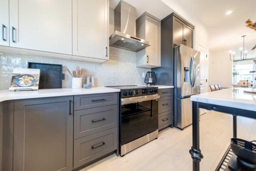 524 Tekarra Drive Nw, Calgary, AB - Indoor Photo Showing Kitchen With Upgraded Kitchen
