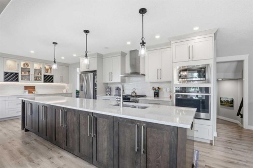 5933 45 Street Crescent, Innisfail, AB - Indoor Photo Showing Kitchen With Double Sink With Upgraded Kitchen