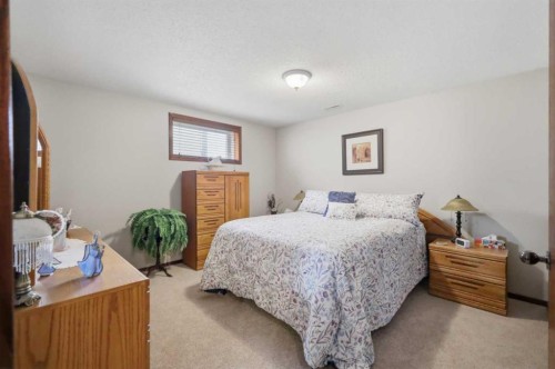6026 47 Street, Innisfail, AB - Indoor Photo Showing Bedroom