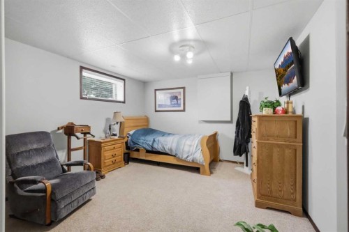 6026 47 Street, Innisfail, AB - Indoor Photo Showing Bedroom
