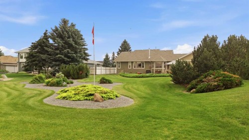 6026 47 Street, Innisfail, AB - Outdoor With Backyard