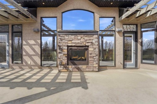 68 Oakwood Close, Red Deer, AB - Outdoor With Fireplace