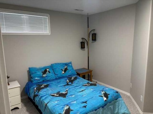 58 Logan Close, Red Deer, AB - Indoor Photo Showing Bedroom