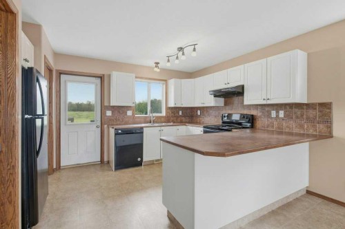36 Keen Crescent, Red Deer, AB - Indoor Photo Showing Kitchen With Double Sink