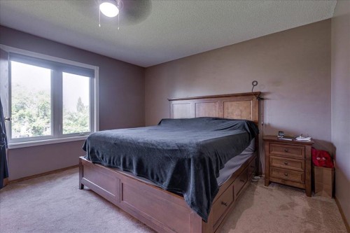 3908 39 Street Close, Ponoka, AB - Indoor Photo Showing Bedroom