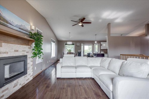 3908 39 Street Close, Ponoka, AB - Indoor Photo Showing Living Room With Fireplace