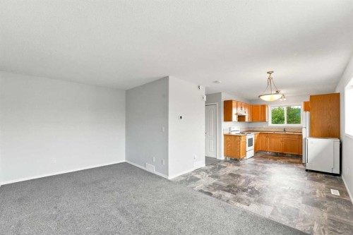 A-1205 Fleming Avenue, Penhold, AB - Indoor Photo Showing Other Room