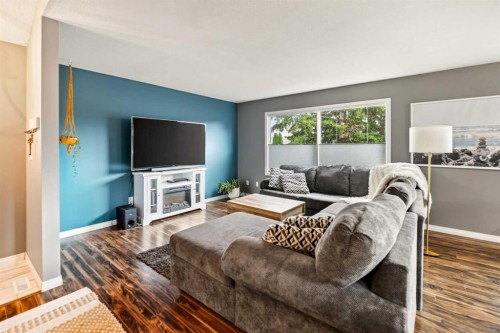 12 Opal Close, Lacombe, AB - Indoor Photo Showing Living Room With Fireplace