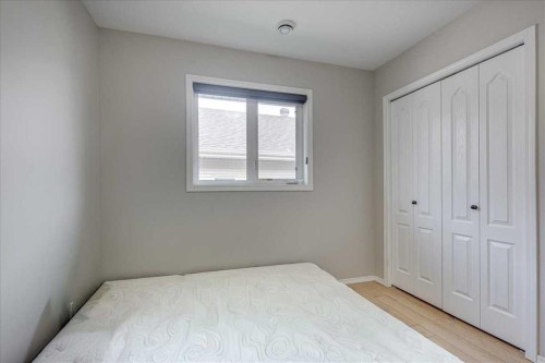 13 Rogers Road, Sylvan Lake, AB - Indoor Photo Showing Bedroom
