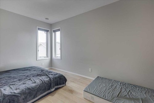 13 Rogers Road, Sylvan Lake, AB - Indoor Photo Showing Bedroom
