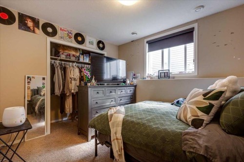 13 Rogers Road, Sylvan Lake, AB - Indoor Photo Showing Bedroom
