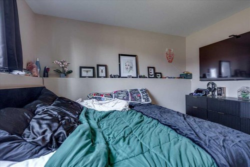 13 Rogers Road, Sylvan Lake, AB - Indoor Photo Showing Bedroom