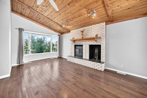 37 Kennings Crescent, Red Deer, AB - Indoor Photo Showing Living Room With Fireplace