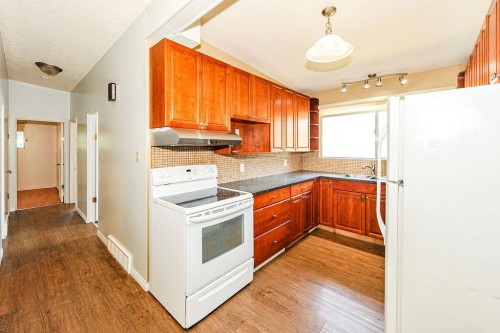88-Mount Pleasant Drive, Camrose, AB - Indoor Photo Showing Kitchen With Double Sink