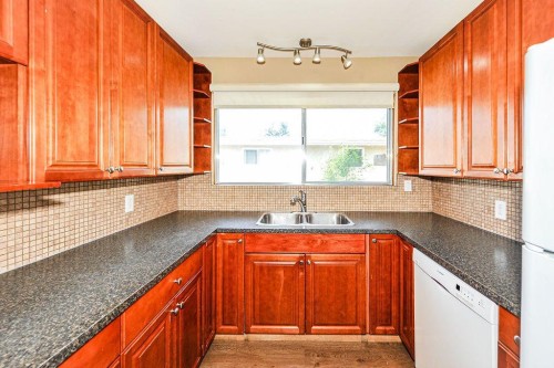 88-Mount Pleasant Drive, Camrose, AB - Indoor Photo Showing Kitchen With Double Sink