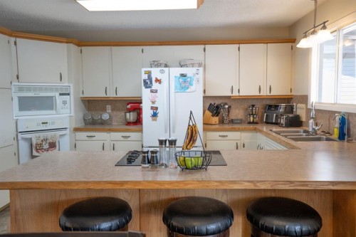 22 Robinson Place, Bashaw, AB - Indoor Photo Showing Kitchen With Double Sink