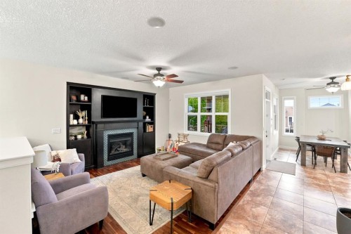 100 Vincent Close, Red Deer, AB - Indoor Photo Showing Living Room With Fireplace