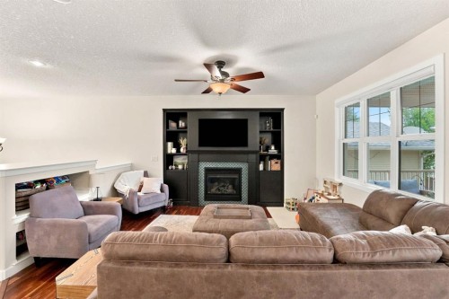 100 Vincent Close, Red Deer, AB - Indoor Photo Showing Living Room With Fireplace
