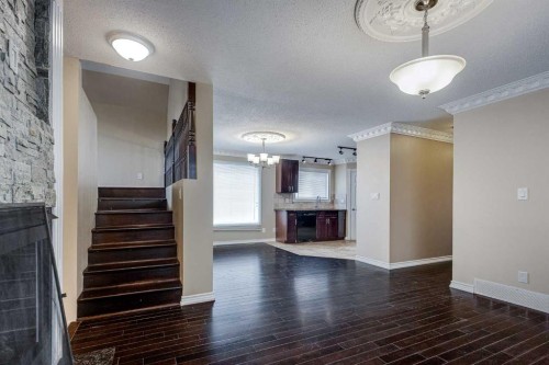 24 Mackenzie Crescent, Lacombe, AB - Indoor With Fireplace