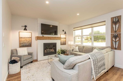 5925 Panorama Drive, Blackfalds, AB - Indoor Photo Showing Living Room With Fireplace