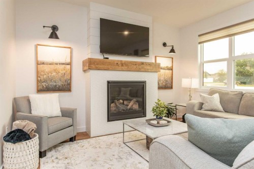 5925 Panorama Drive, Blackfalds, AB - Indoor Photo Showing Living Room With Fireplace