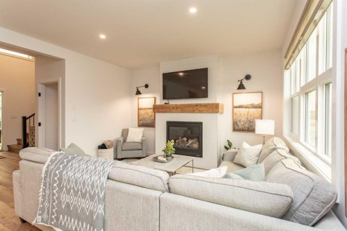 5925 Panorama Drive, Blackfalds, AB - Indoor Photo Showing Living Room With Fireplace