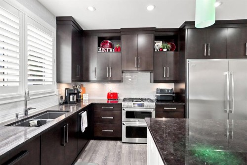 200 Vancouver Crescent, Red Deer, AB - Indoor Photo Showing Kitchen With Double Sink With Upgraded Kitchen