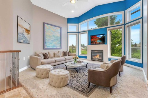 42 Langford Crescent, Red Deer, AB - Indoor Photo Showing Living Room With Fireplace