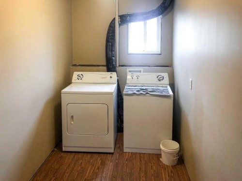 7019 Deer Street, Lacombe, AB - Indoor Photo Showing Laundry Room
