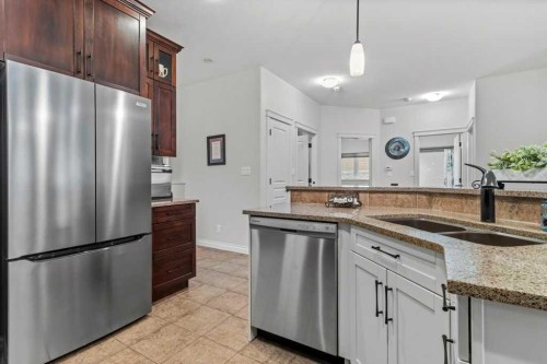 4112 45 Avenue, Sylvan Lake, AB - Indoor Photo Showing Kitchen With Stainless Steel Kitchen With Double Sink