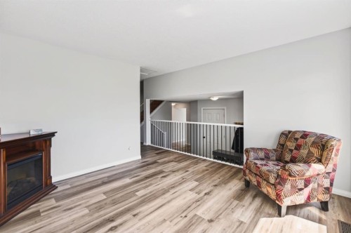 171 Douglas Avenue, Red Deer, AB - Indoor With Fireplace