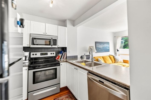 24-6300 Orr Drive, Red Deer, AB - Indoor Photo Showing Kitchen With Stainless Steel Kitchen With Double Sink