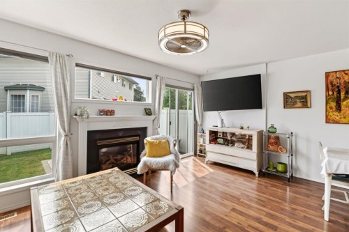24-6300 Orr Drive, Red Deer, AB - Indoor With Fireplace