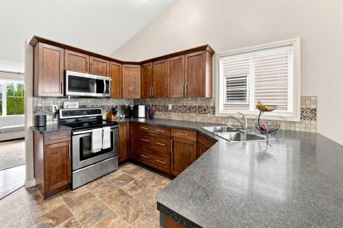 184 Timberstone Way, Red Deer, AB - Indoor Photo Showing Kitchen With Double Sink