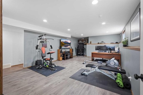 34 Wilkinson Circle, Sylvan Lake, AB - Indoor Photo Showing Gym Room