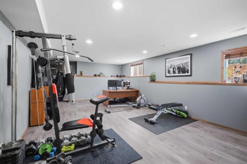34 Wilkinson Circle, Sylvan Lake, AB - Indoor Photo Showing Gym Room