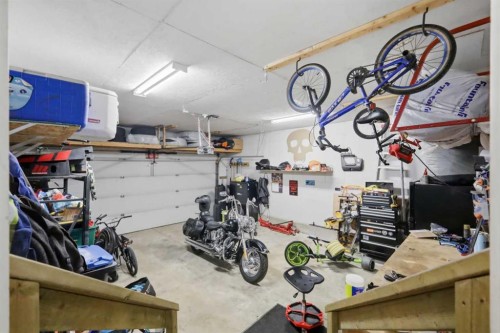 34 Wilkinson Circle, Sylvan Lake, AB - Indoor Photo Showing Garage