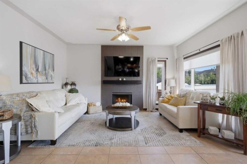21 Leung Close, Red Deer, AB - Indoor Photo Showing Living Room With Fireplace
